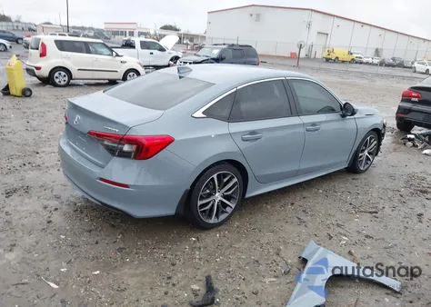 2023 Honda Civic Touring from USA, damaged, VIN 2HGFE1F92PH305577